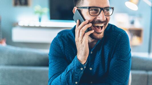 man-laughing-on-the-phone