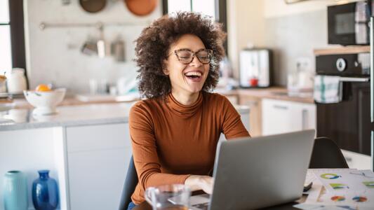 woman-laptop-kitchen